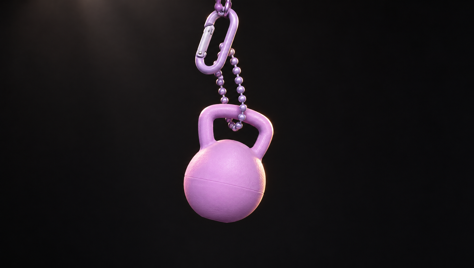 Kettlebell keychain hanging from a ball chain and clip