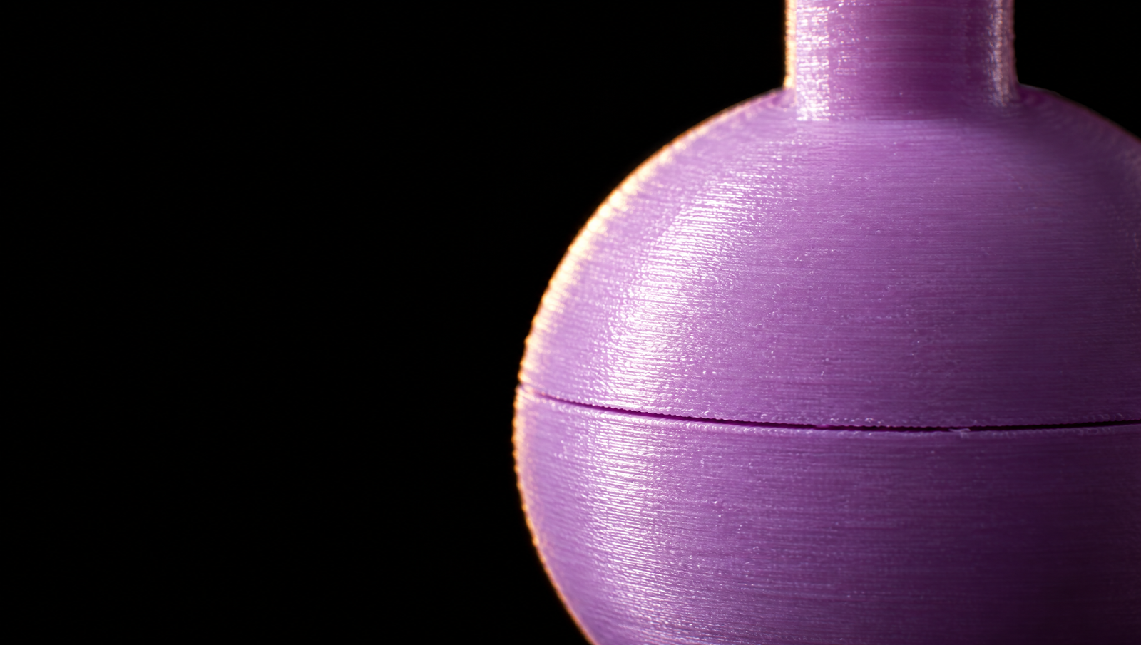 Close-up of the threaded closure on the kettlebell keychain